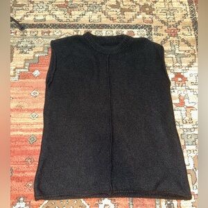 Black sweater vest
